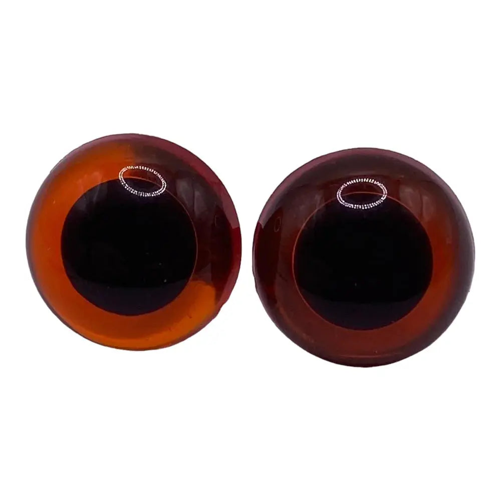 Pair of brown doll eyes.