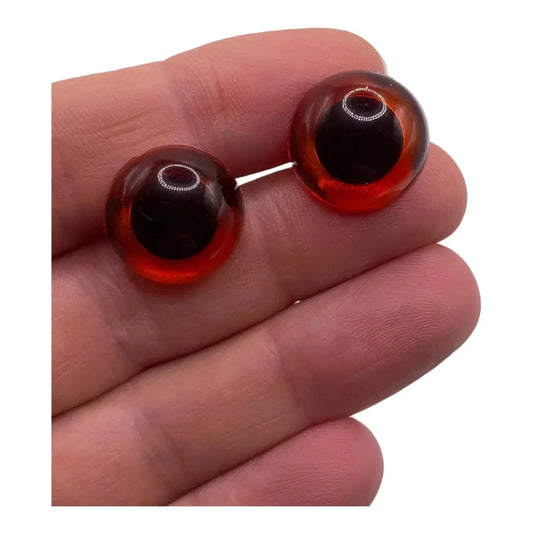 Red and black glass eyes.