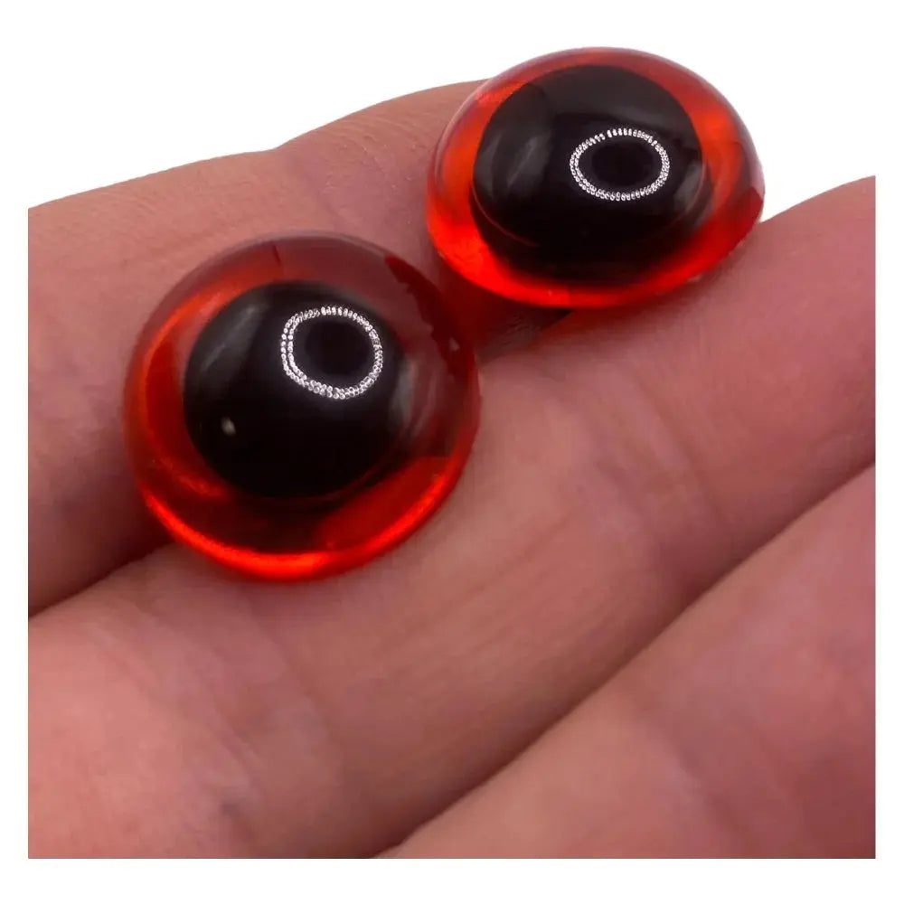 Red and black glass eyes.