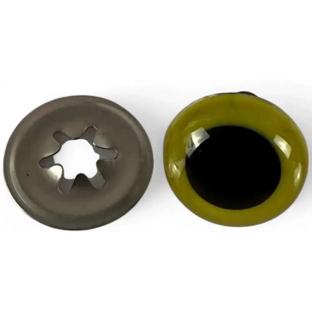 Olive-green googly eye and a metal fastener.