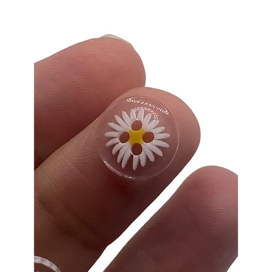 Clear daisy button.