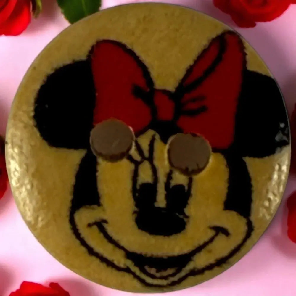 Minnie Mouse button.