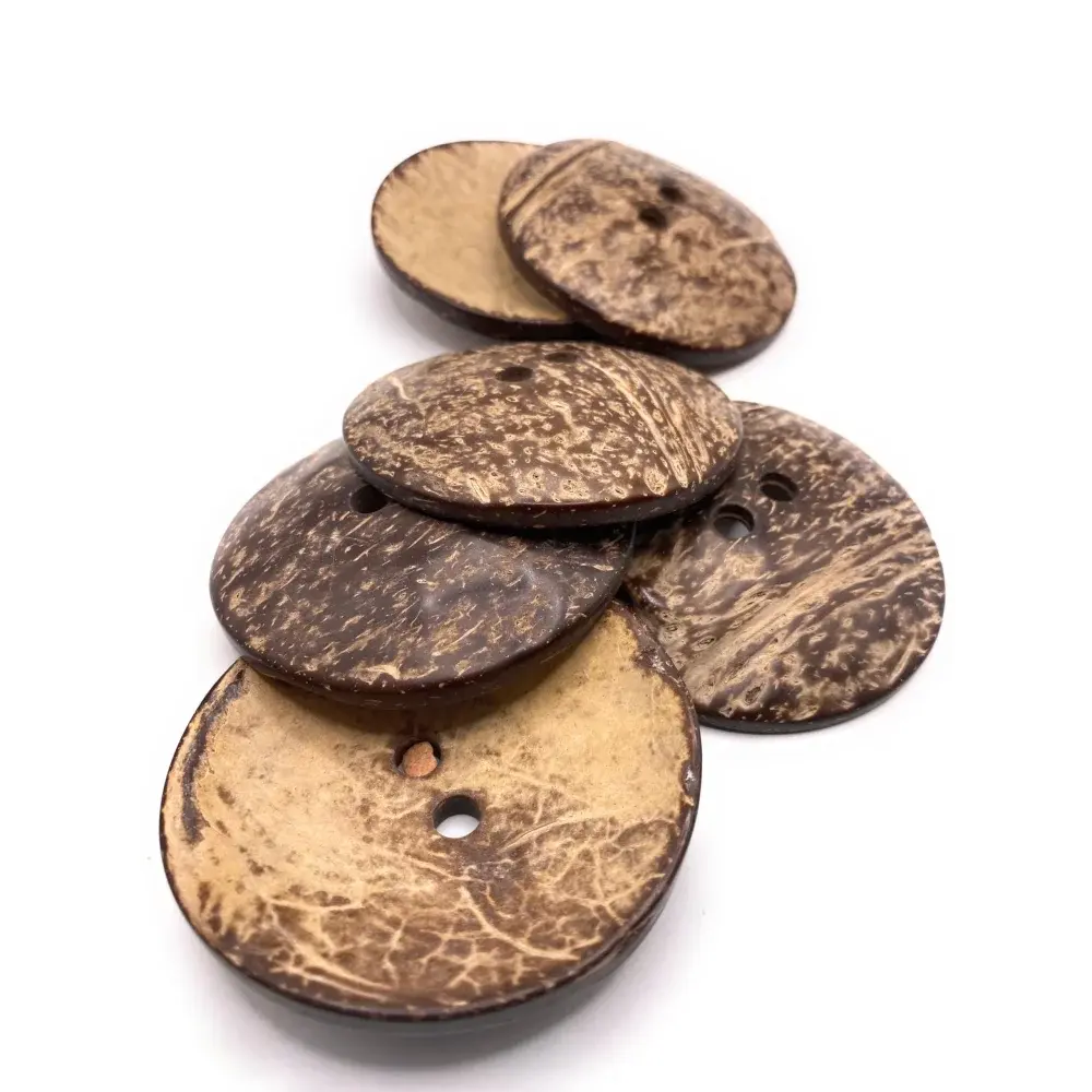 Pile of round coconut buttons.