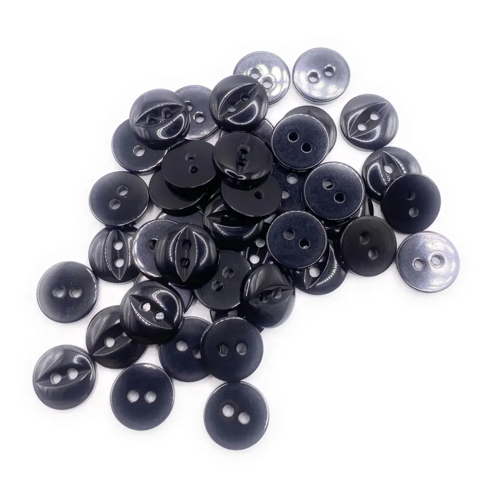 Pile of black and silver buttons.