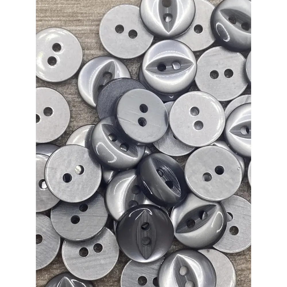 Assorted gray two-hole buttons.