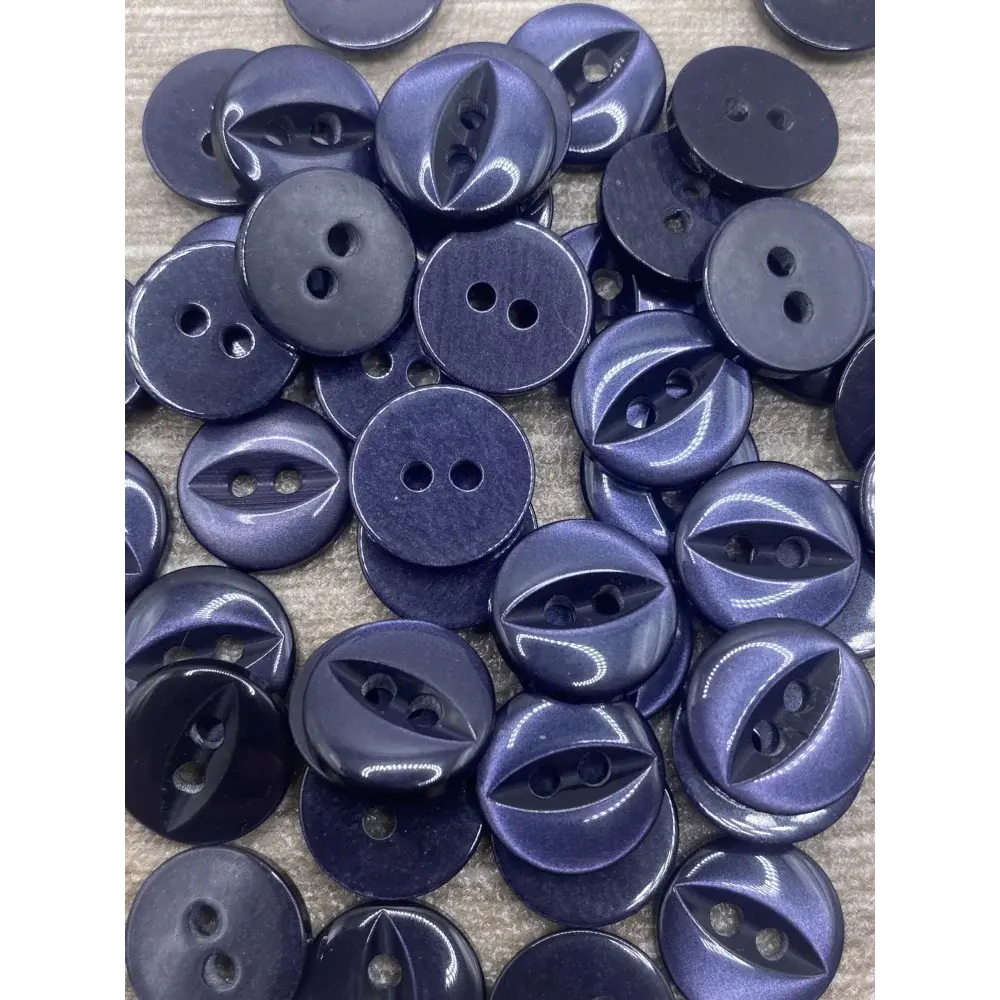 Pile of two-hole blue buttons.