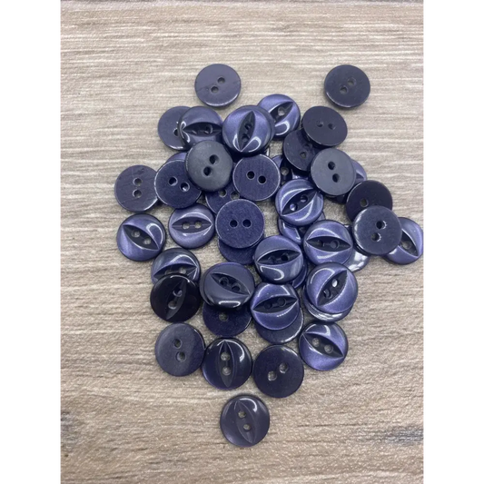 Pile of dark purple buttons.
