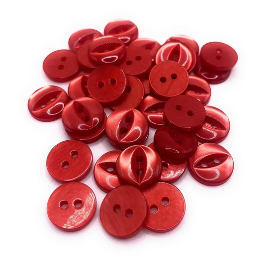 Pile of red, two-hole buttons.