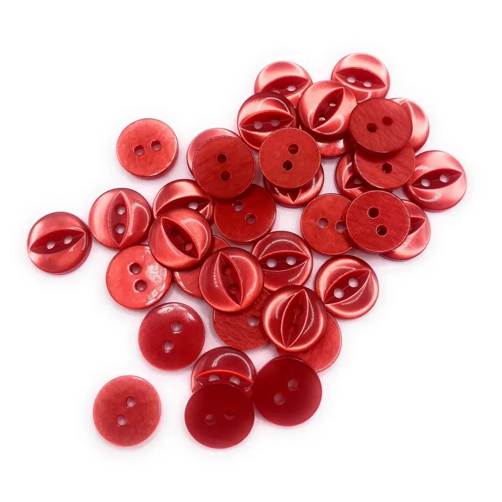 Pile of red, two-hole buttons.