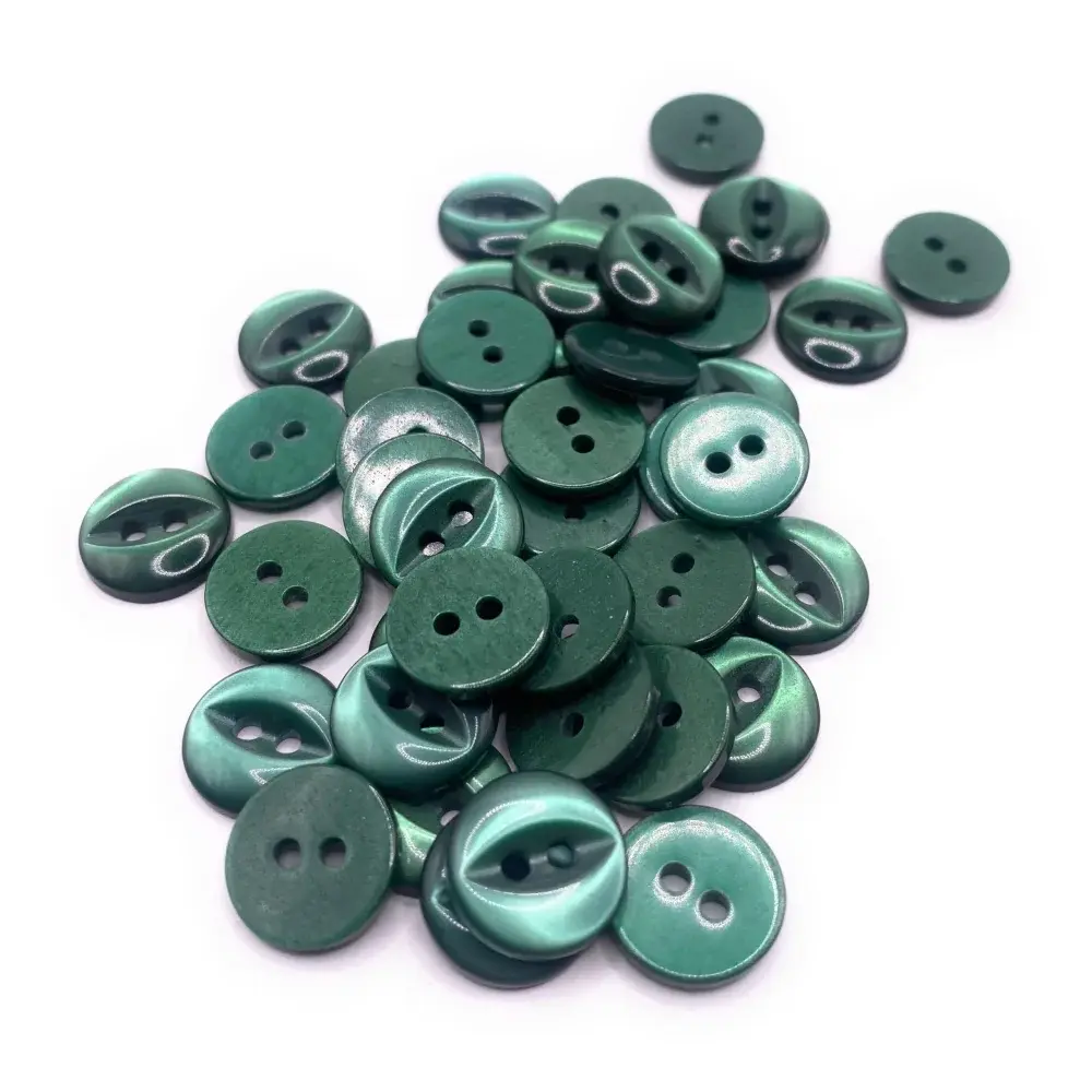 Pile of green sewing buttons.