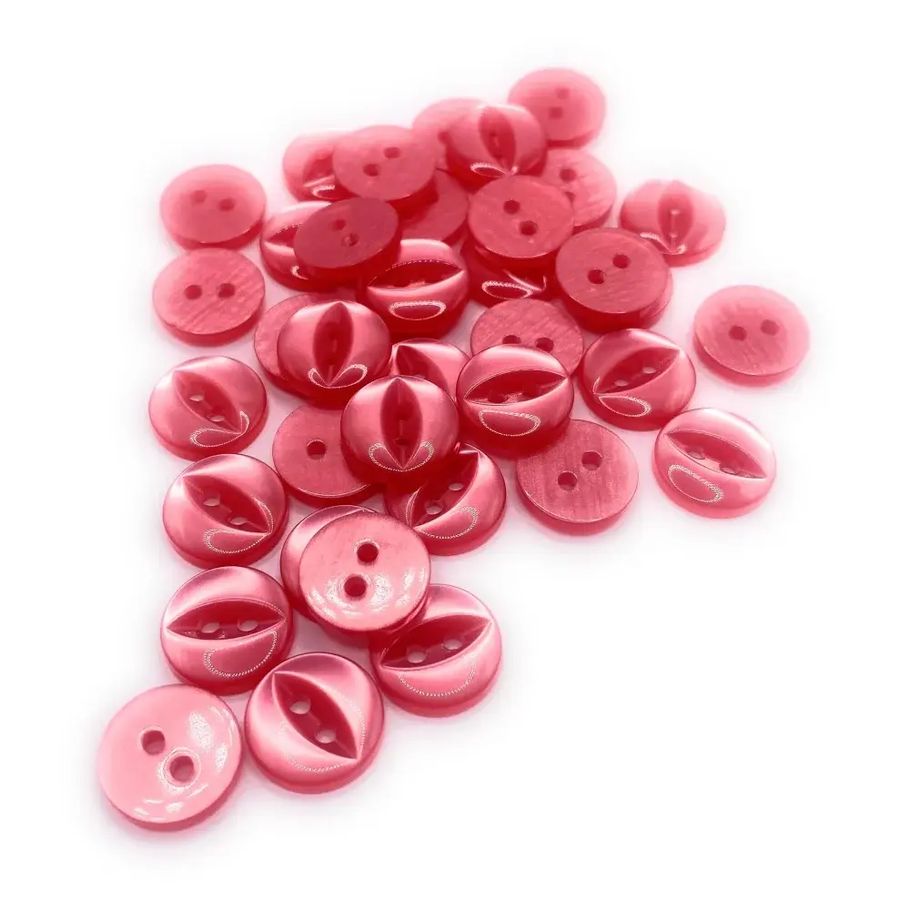 Pile of pink two-hole buttons.