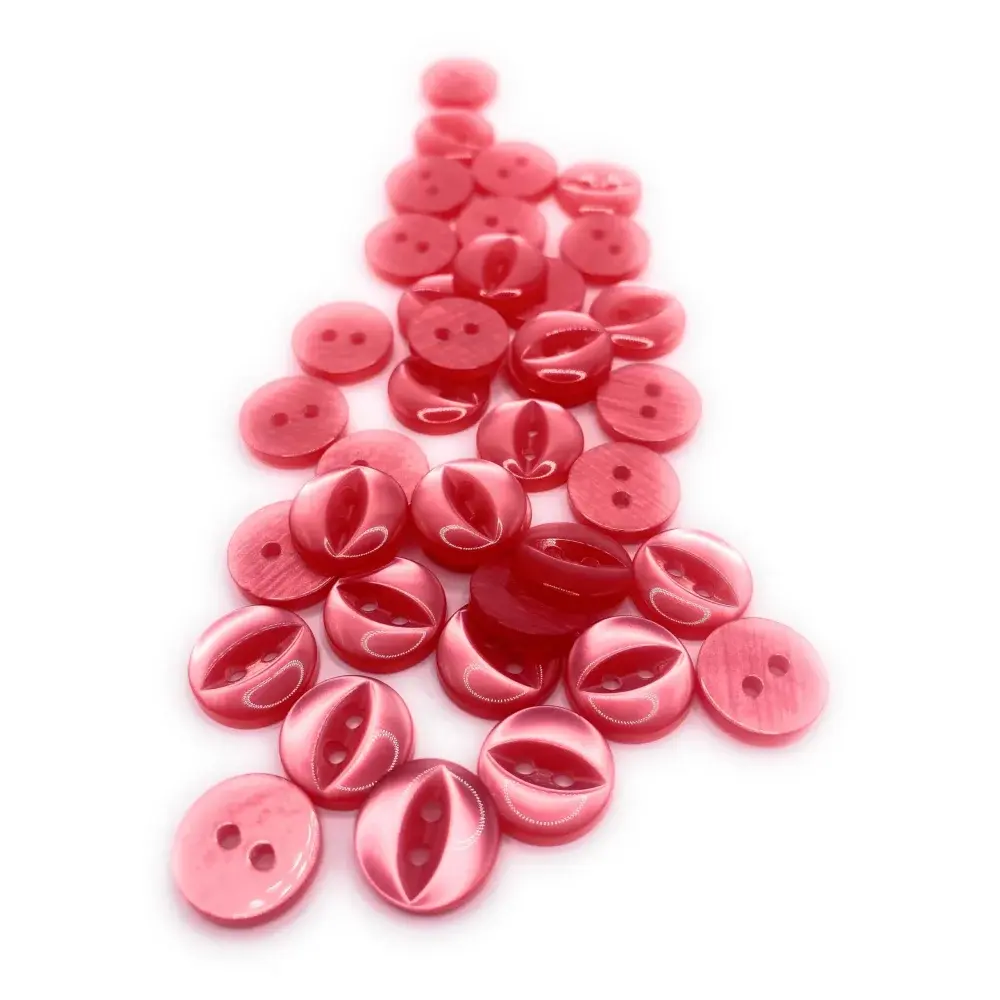Pile of pink and red buttons.