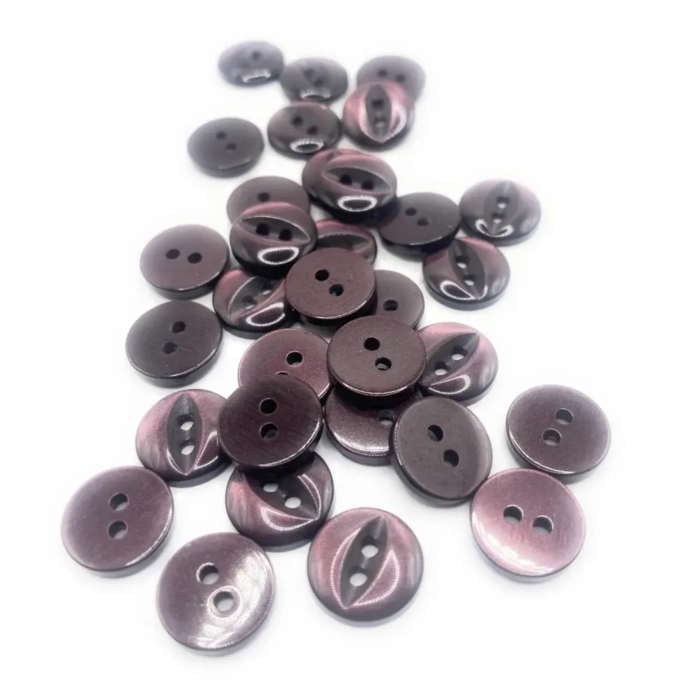 Pile of two-hole brown buttons.