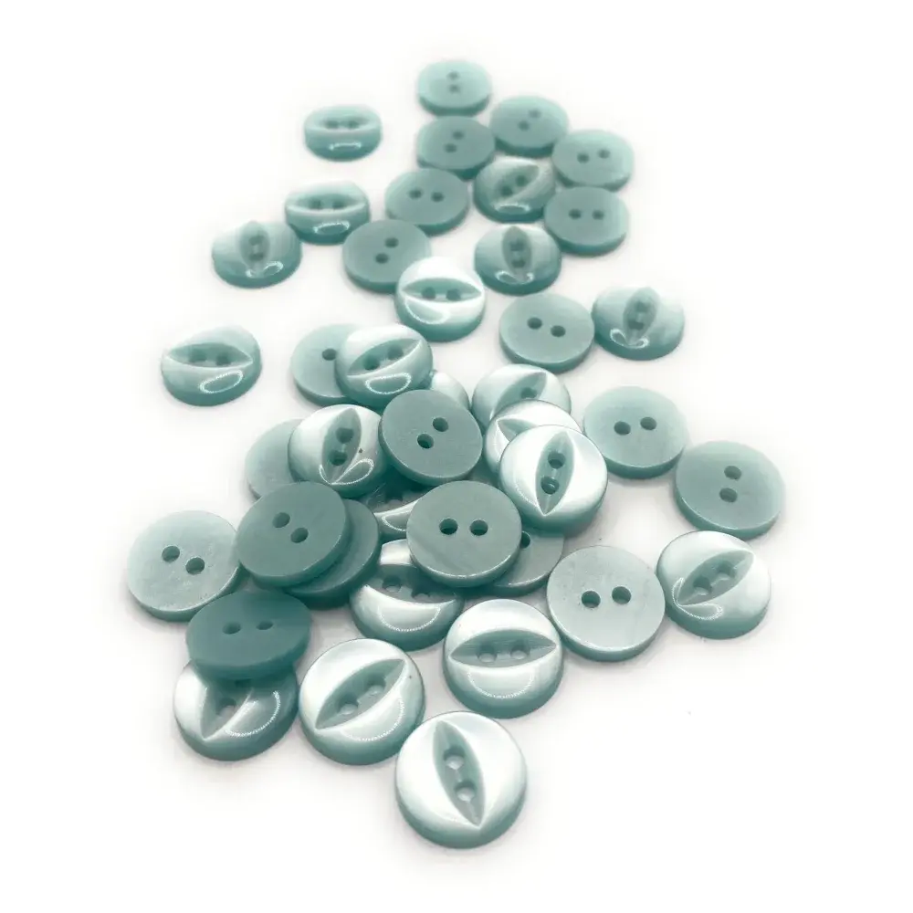 Pile of two-hole teal buttons.