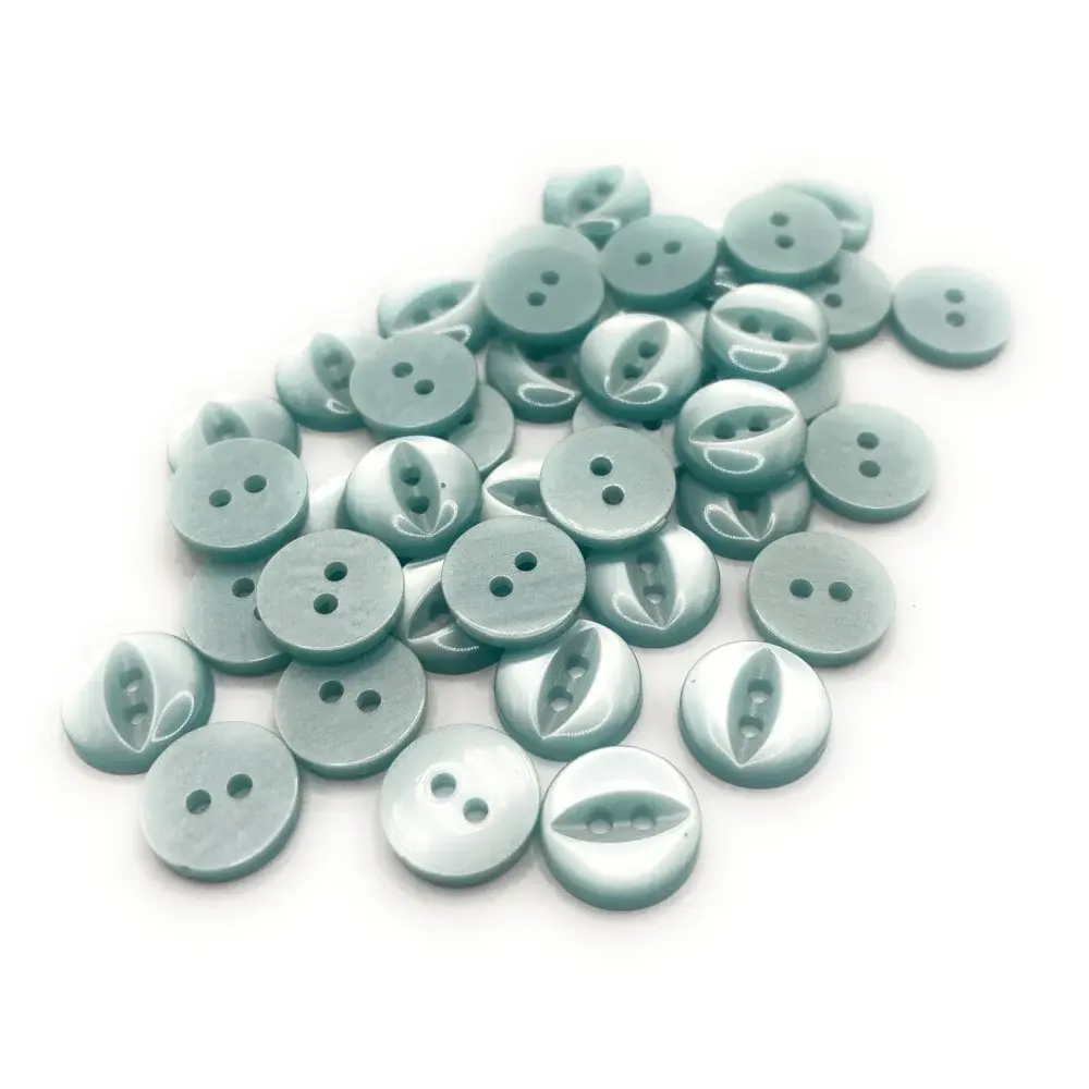 Pile of two-hole, light blue buttons.