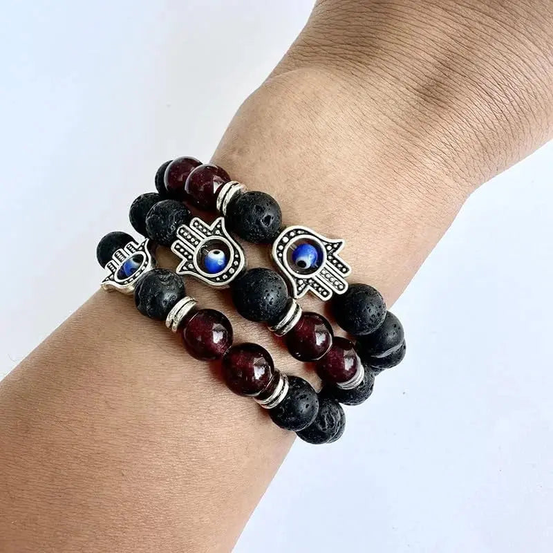 Three beaded Hamsa bracelets.
