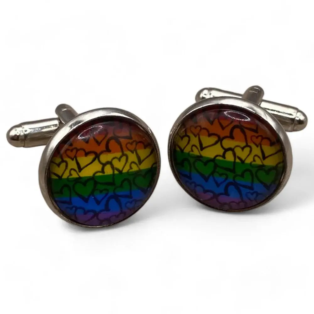 Pair of rainbow heart cufflinks.