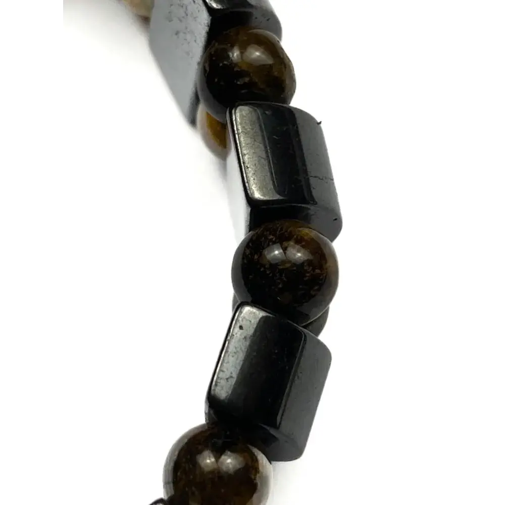 Bracelet with dark beads and rectangular stones.