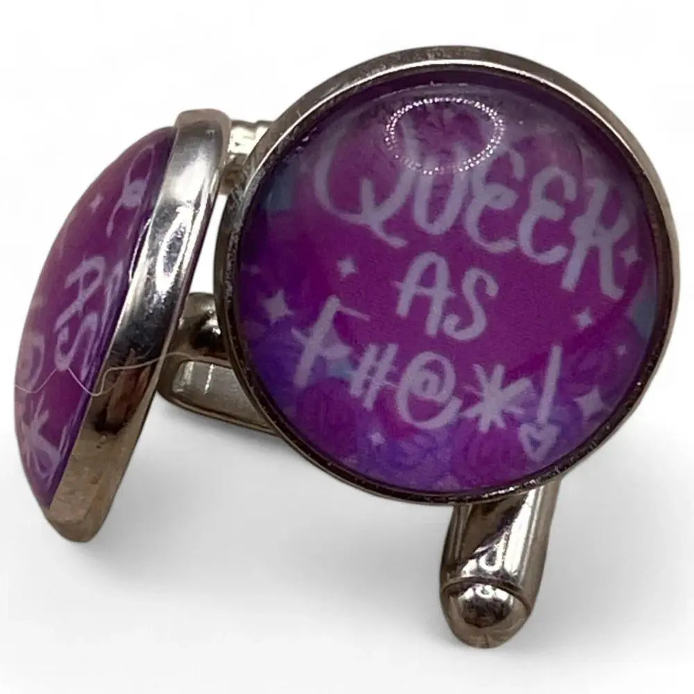 Purple cufflinks with explicit text.
