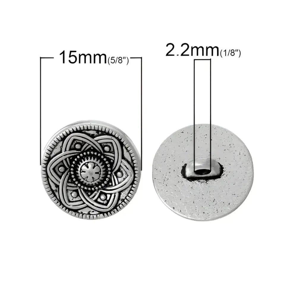 Silver-toned patterned shank button.