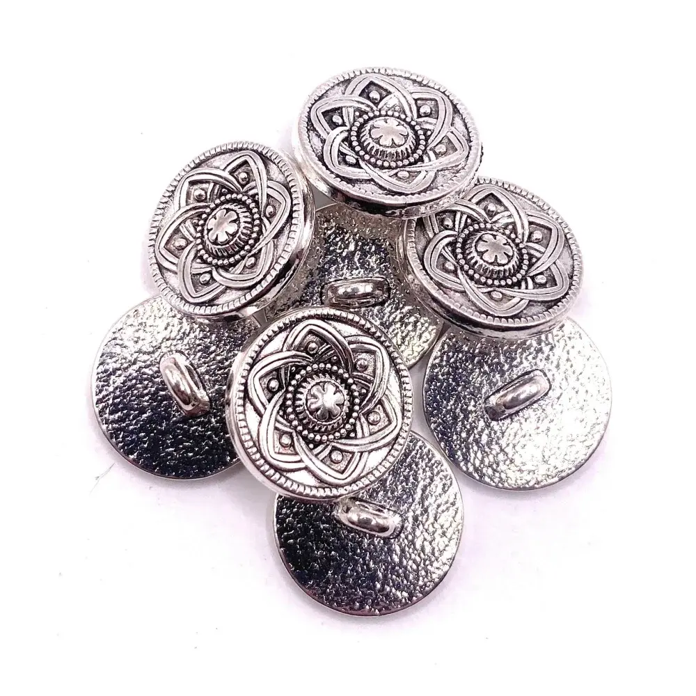 Silver decorative shank buttons.