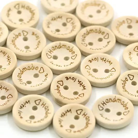 Wooden buttons with ’Handmade with love’ inscription.