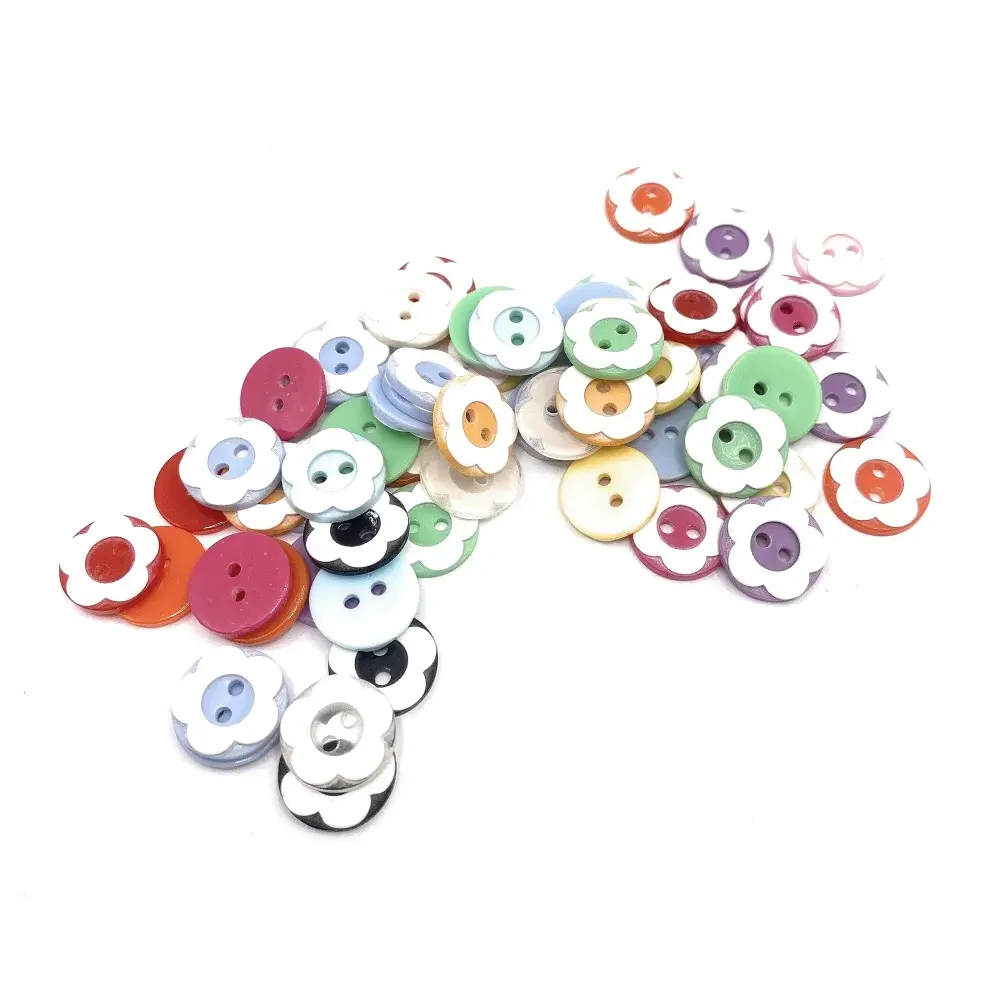 Pile of colorful flower-shaped buttons.