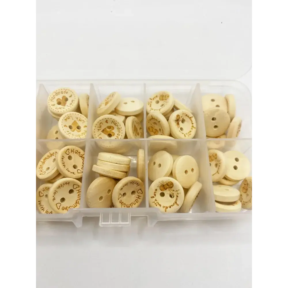 Compartmentalized collection of craft buttons.