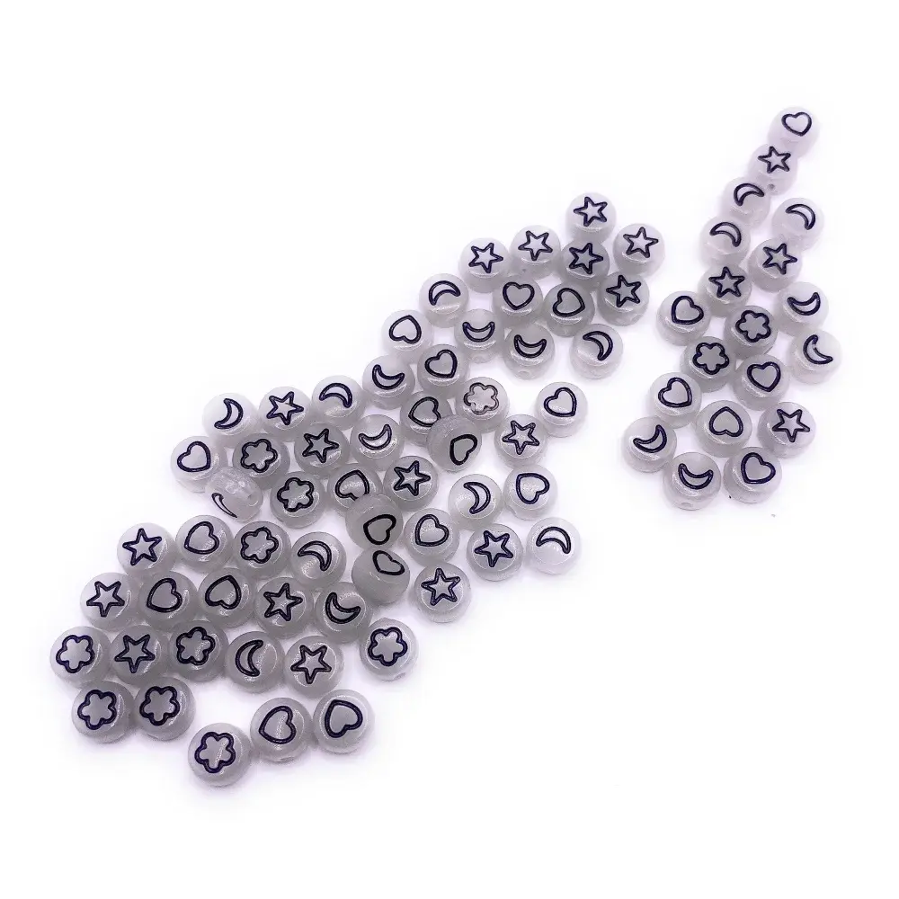 Translucent beads with star, moon, heart, and flower shapes.