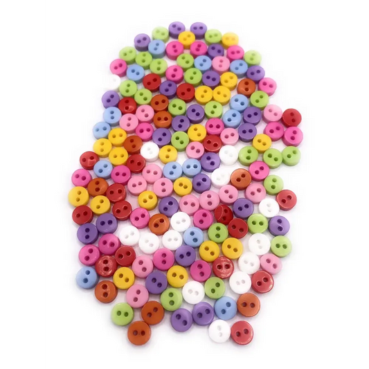 Pile of colorful two-hole buttons.