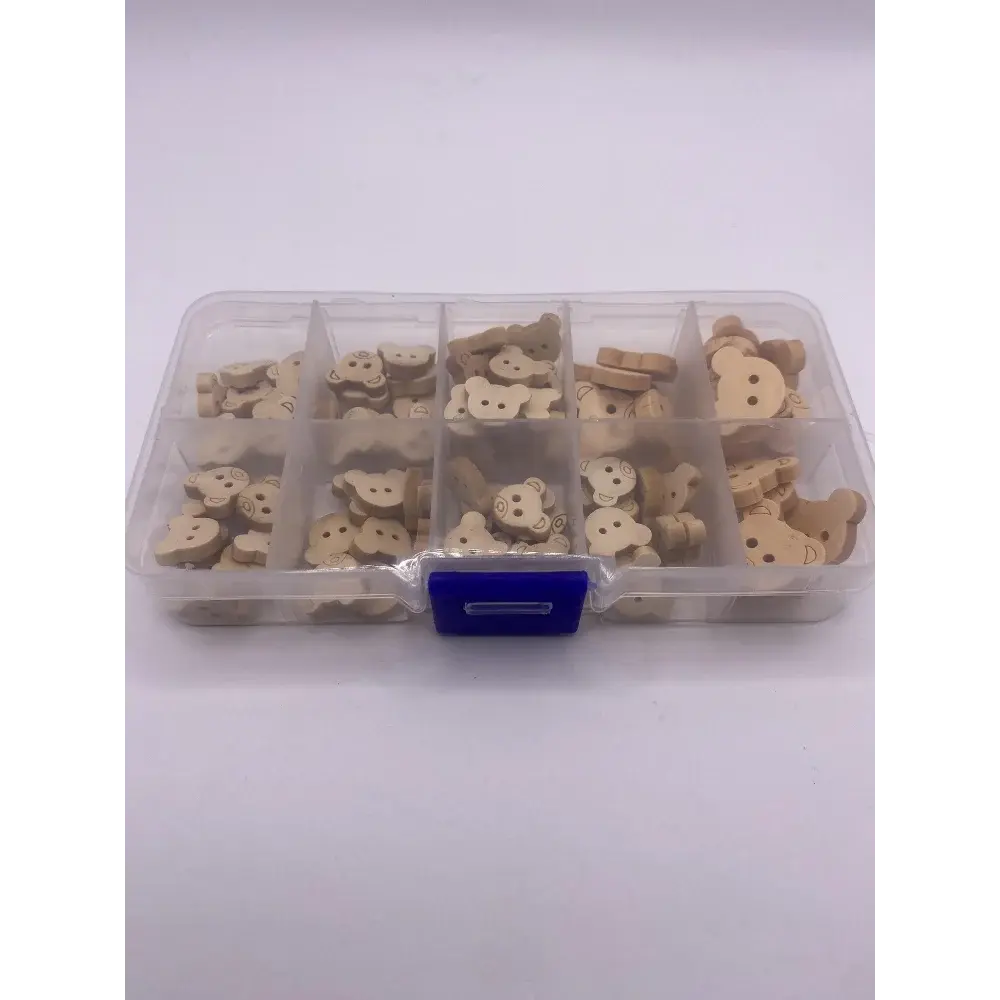 Compartmentalized box of wooden bear buttons.