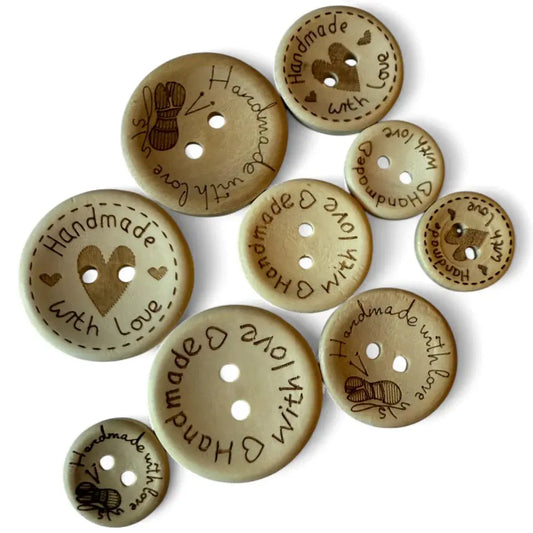 Handmade wooden buttons with various designs.