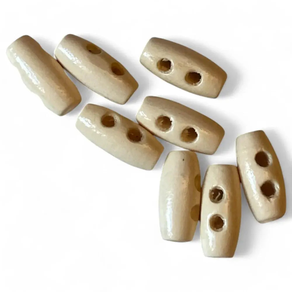 Wooden toggle buttons.