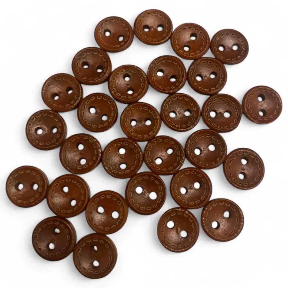 Pile of brown, two-hole buttons.