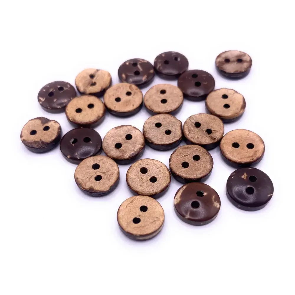 Pile of brown coconut buttons.