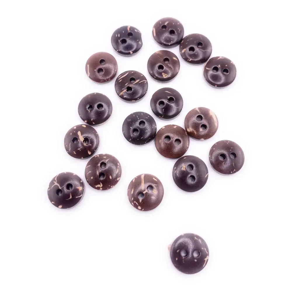 Pile of brown coconut buttons.