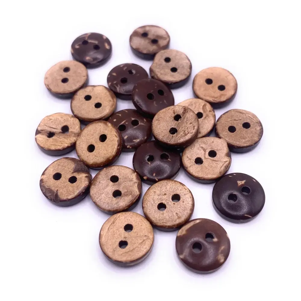 Pile of two-hole coconut buttons.