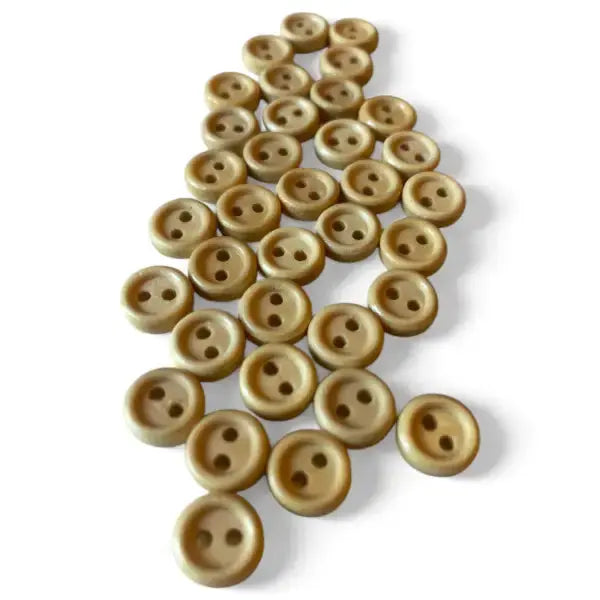 Pile of two-hole wooden buttons.