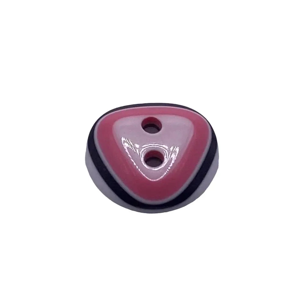 Triangular pink and white button.