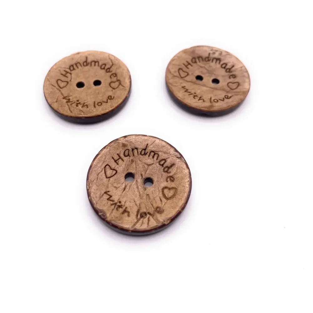 Three round, brown, two-hole buttons.