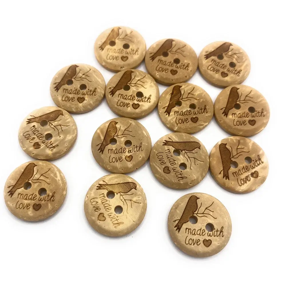 Round, wooden buttons with bird and ’made with love’ design.
