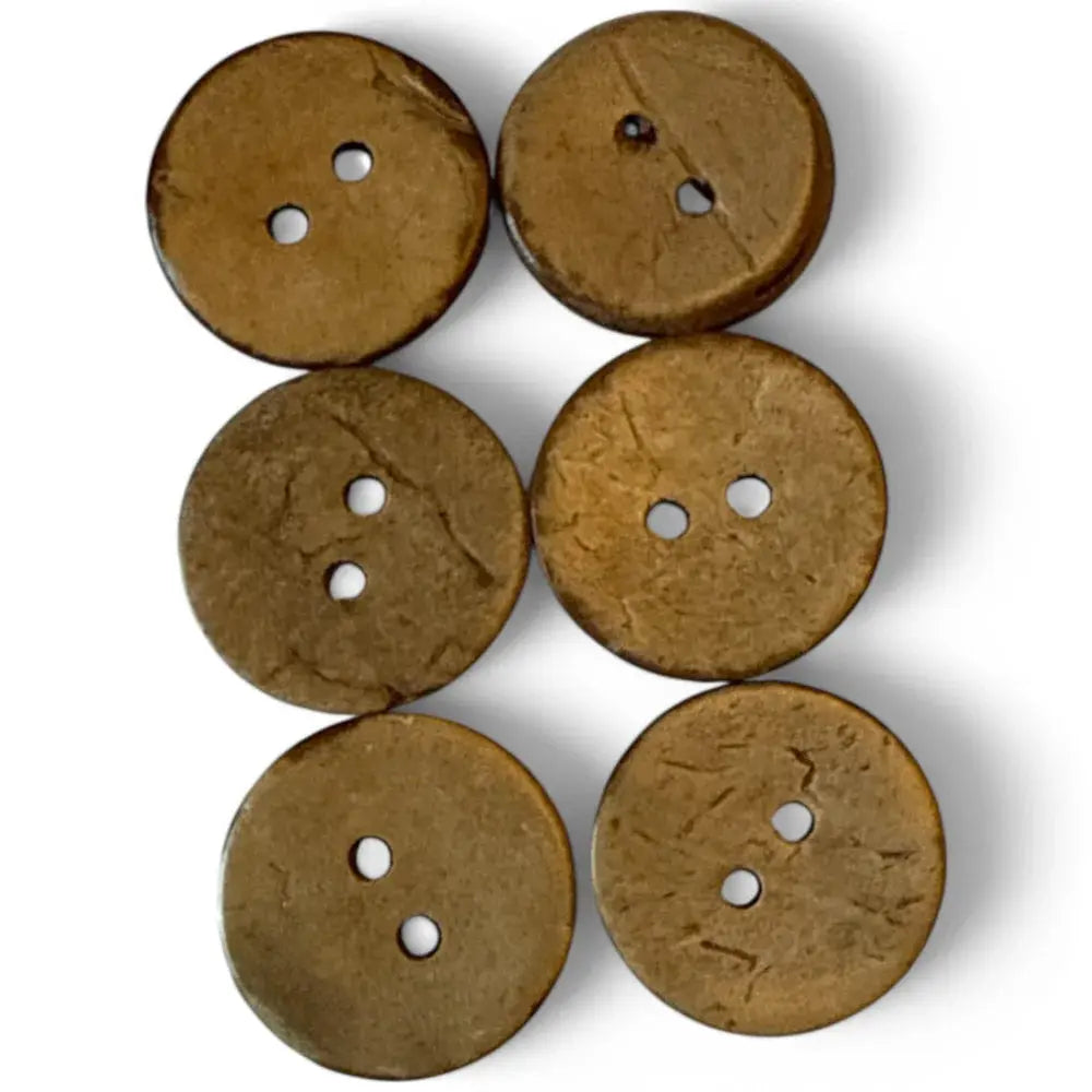 Six brown coconut buttons.