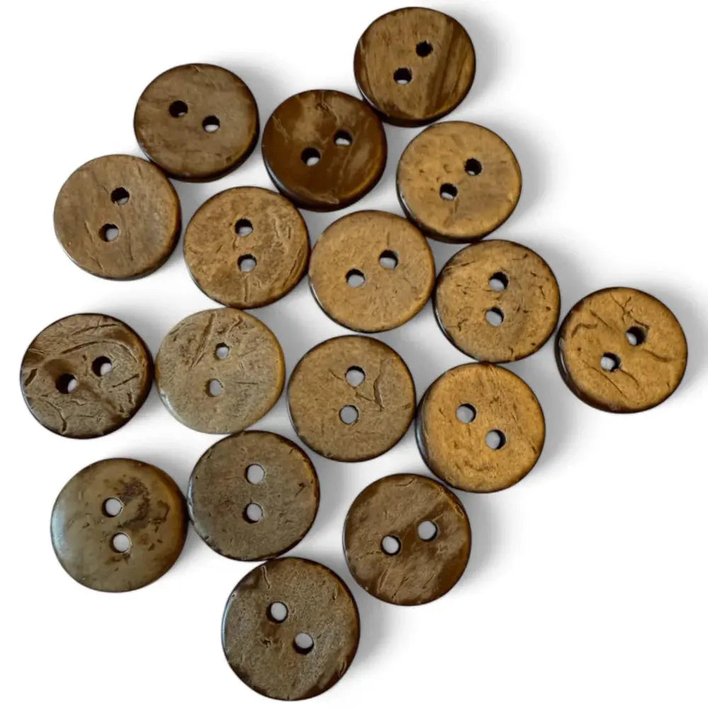 Pile of brown, two-hole buttons.
