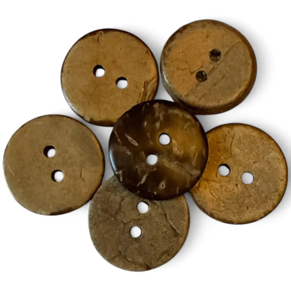 Six brown coconut buttons.