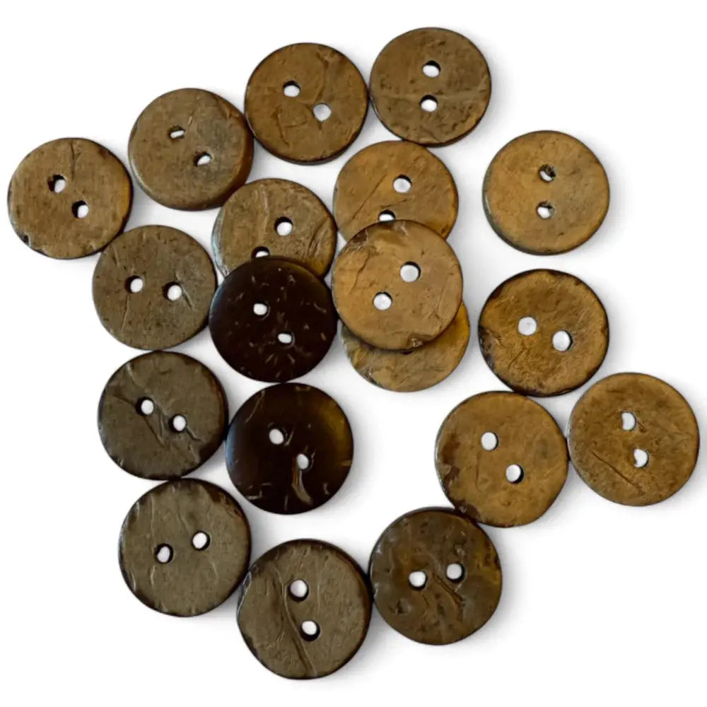 Pile of brown coconut buttons.
