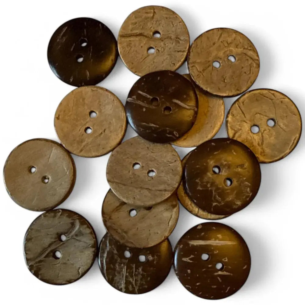 Pile of two-hole coconut buttons.