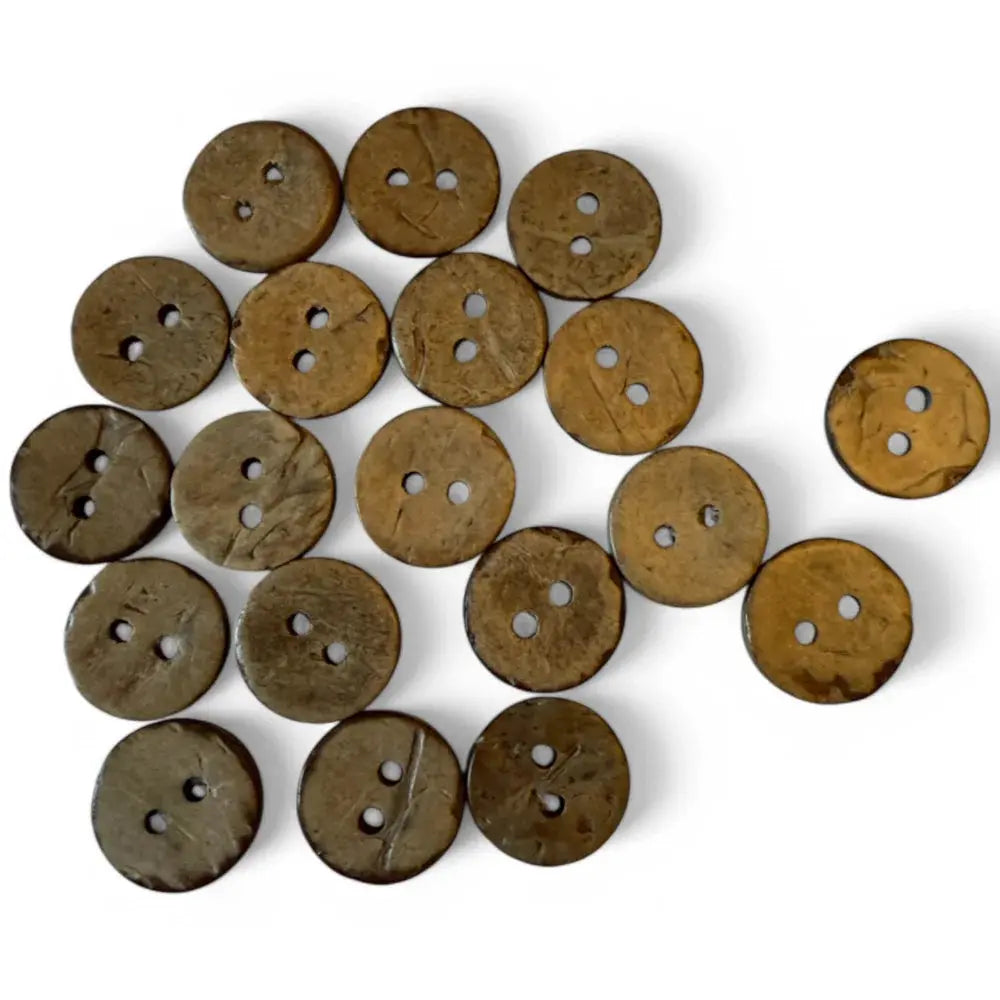 Pile of brown coconut buttons.