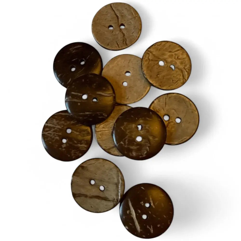 Pile of brown coconut buttons.