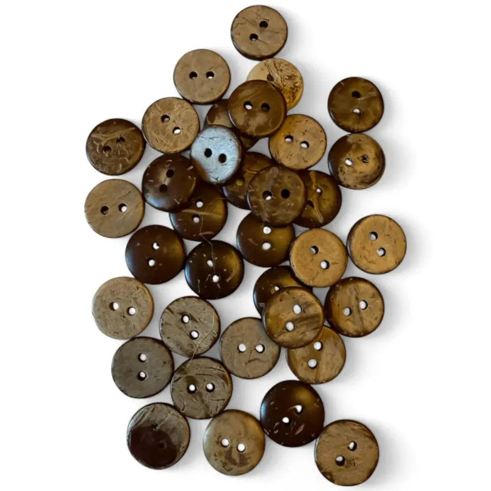 Pile of brown coconut buttons.