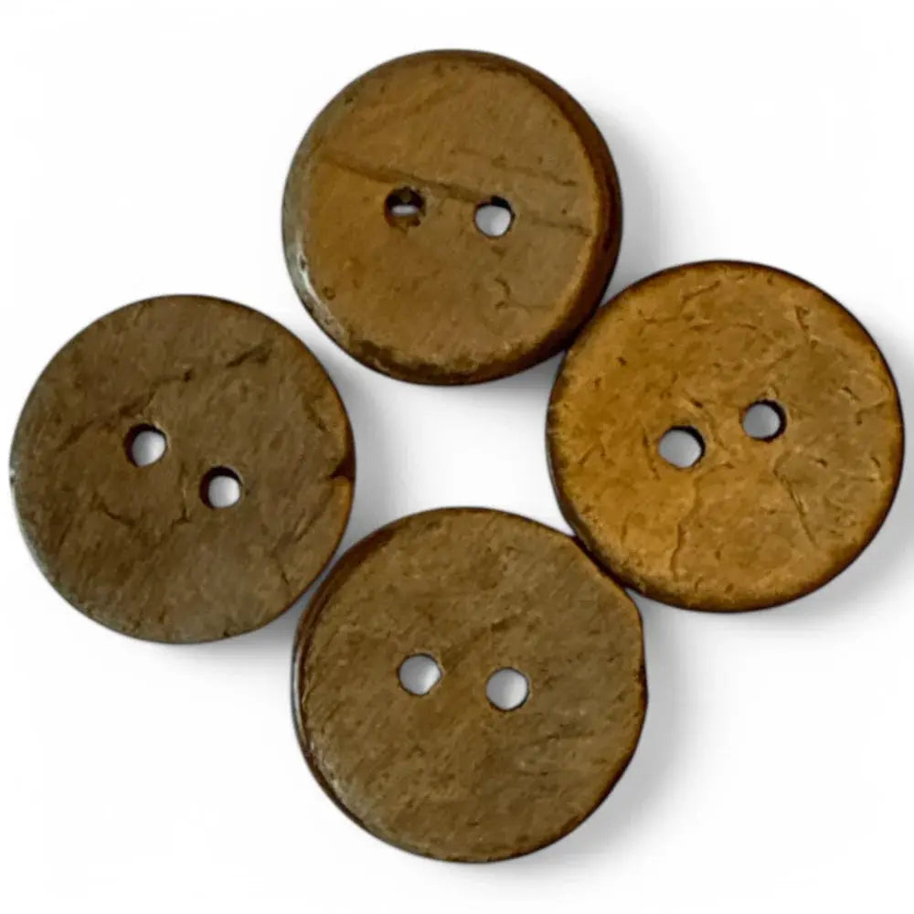 Four brown coconut buttons.